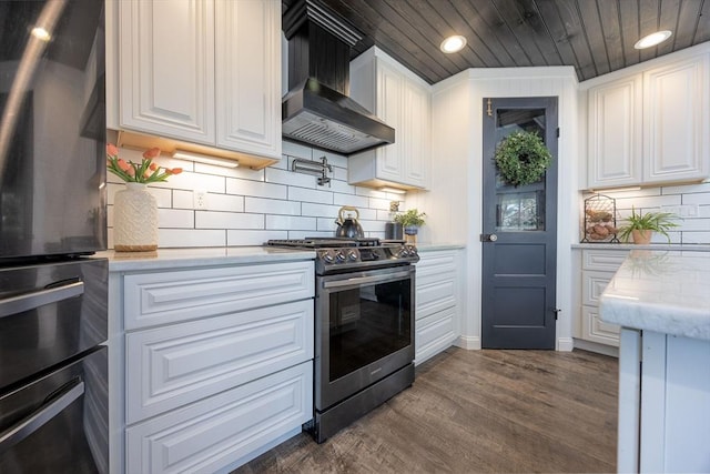 20 Bailey Shr, Hampstead, NH 03841 - kitchen featuring gas stove, wall chimney exhaust hood, light countertops, white cabinets, and recessed lighting