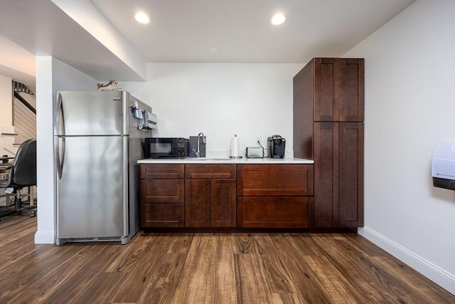 20 Bailey Shr, Hampstead, NH 03841 - kitchen with freestanding refrigerator, black microwave, dark wood finished floors, light countertops, and baseboards
