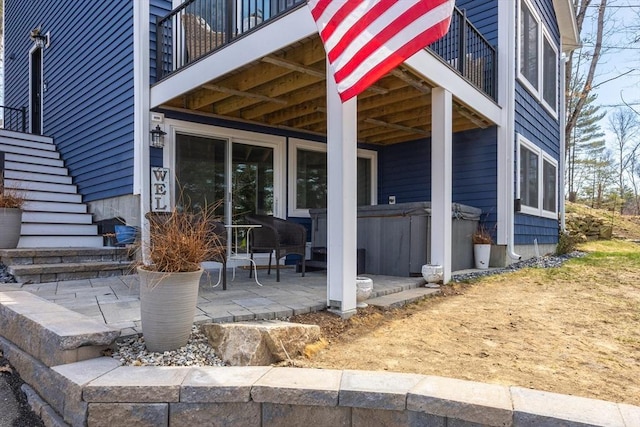 20 Bailey Shr, Hampstead, NH 03841 - doorway to property with a hot tub, a balcony, and a patio