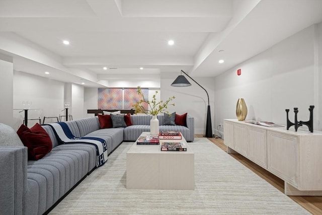 living area featuring recessed lighting and light wood-style flooring