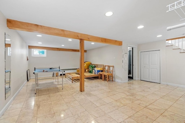 below grade area with recessed lighting, visible vents, stairway, and baseboards