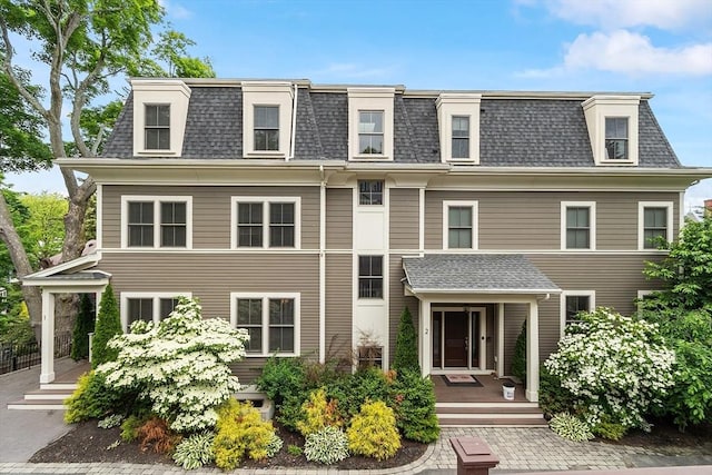 33 Winthrop Unit 1, Brookline, MA 02445 - view of front of house with mansard roof and a shingled roof