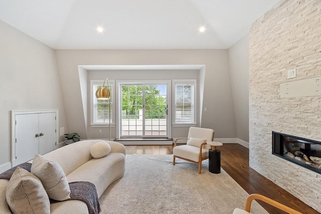 33 Winthrop Unit 1, Brookline, MA 02445 - living room with dark wood-type flooring, a fireplace, baseboards, and recessed lighting