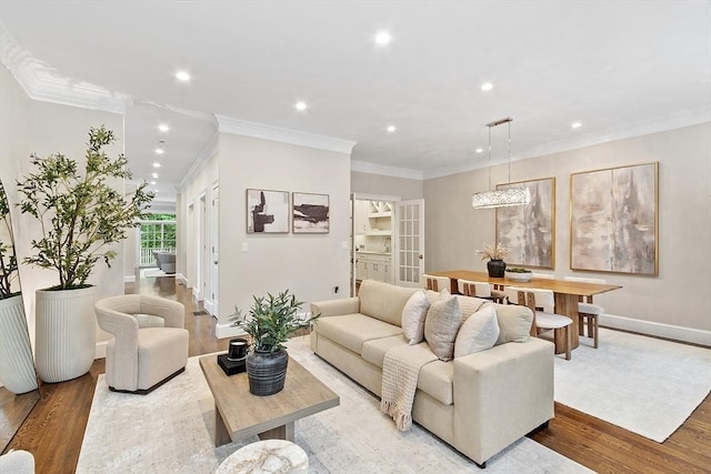 33 Winthrop Unit 1, Brookline, MA 02445 - living room with light wood-style flooring, baseboards, recessed lighting, and ornamental molding