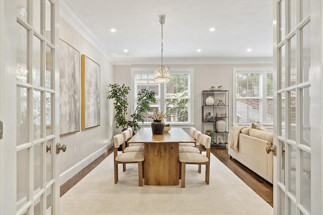 33 Winthrop Unit 1, Brookline, MA 02445 - dining space featuring french doors, dark wood-style floors, ornamental molding, baseboards, and recessed lighting
