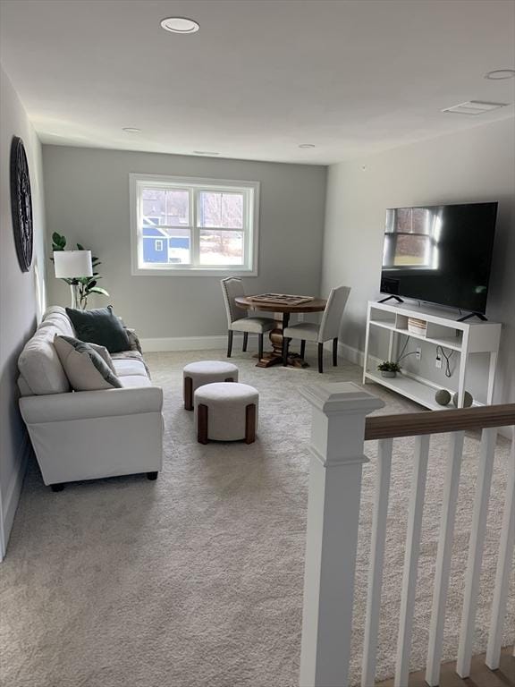 living room with light carpet