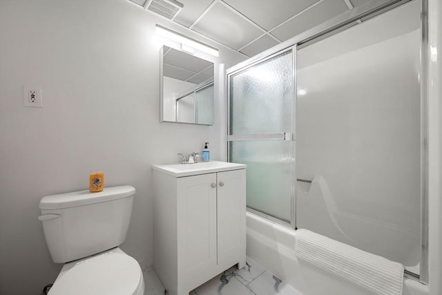 full bathroom with shower / bath combination with glass door, vanity, and toilet