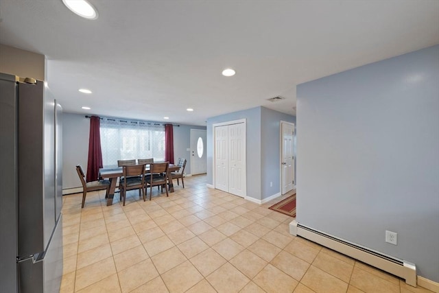 dining space featuring recessed lighting, a baseboard radiator, visible vents, and light tile patterned flooring