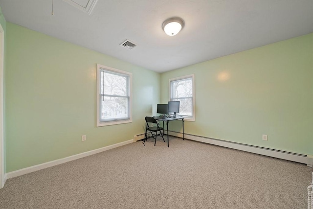 unfurnished office with visible vents, baseboards, attic access, carpet flooring, and a baseboard radiator