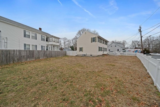 view of yard featuring a fenced backyard