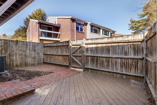 wooden terrace featuring fence private yard