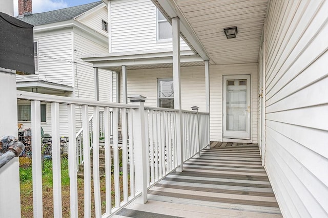 doorway to property featuring a porch