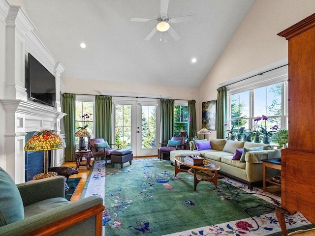8 Sandstone Dr Unit 8, Medway, MA 02053 - living room featuring high vaulted ceiling, healthy amount of natural light, a fireplace, recessed lighting, and french doors