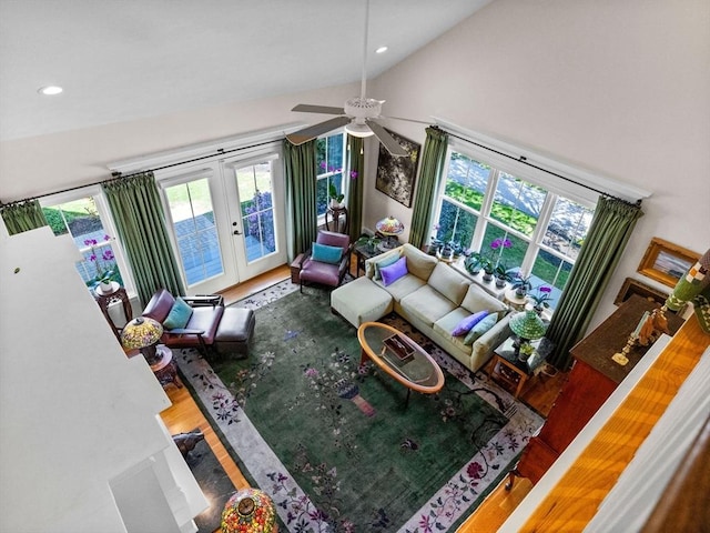 8 Sandstone Dr Unit 8, Medway, MA 02053 - living room featuring wood finished floors, french doors, lofted ceiling, healthy amount of natural light, and ceiling fan