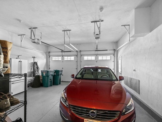 8 Sandstone Dr Unit 8, Medway, MA 02053 - garage featuring a garage door opener