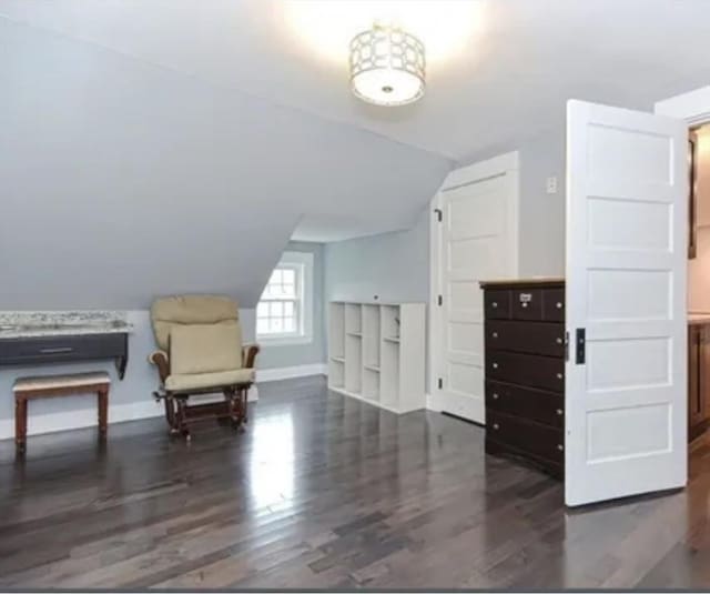 75 William St, Worcester, MA 01609 - sitting room featuring baseboards, wood finished floors, and vaulted ceiling