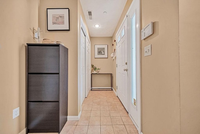 14 Ship Ave Unit 1, Medford, MA 02155 - hallway with baseboards and light tile patterned floors