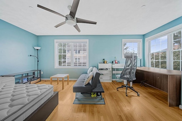14 Ship Ave Unit 1, Medford, MA 02155 - bedroom with a desk, wood finished floors, baseboards, and a ceiling fan