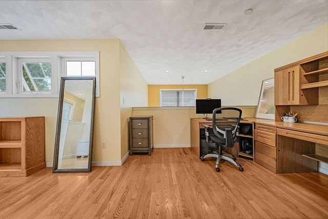 14 Ship Ave Unit 1, Medford, MA 02155 - office area featuring light wood-type flooring, a textured ceiling, and baseboards