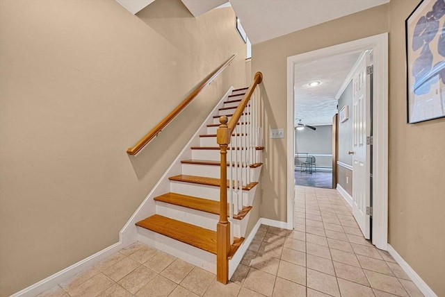 14 Ship Ave Unit 1, Medford, MA 02155 - stairway featuring tile patterned flooring, baseboards, and a ceiling fan