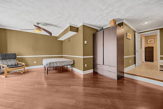 14 Ship Ave Unit 1, Medford, MA 02155 - sitting room featuring wood finished floors, ornamental molding, baseboards, recessed lighting, and ceiling fan