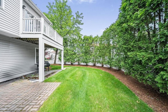 14 Ship Ave Unit 1, Medford, MA 02155 - view of grassy yard featuring a balcony and a patio area