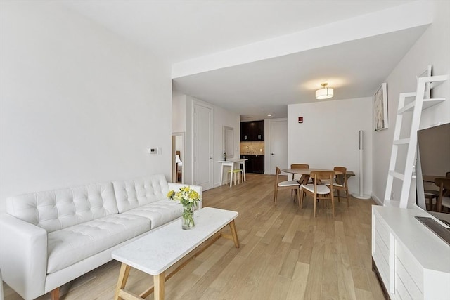 living area with light wood-style floors