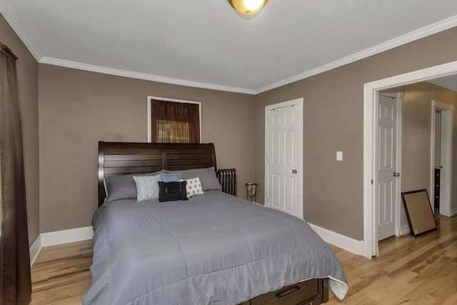 51 Stratford Ter, Springfield, MA 01108 - bedroom featuring baseboards, light wood-type flooring, and ornamental molding