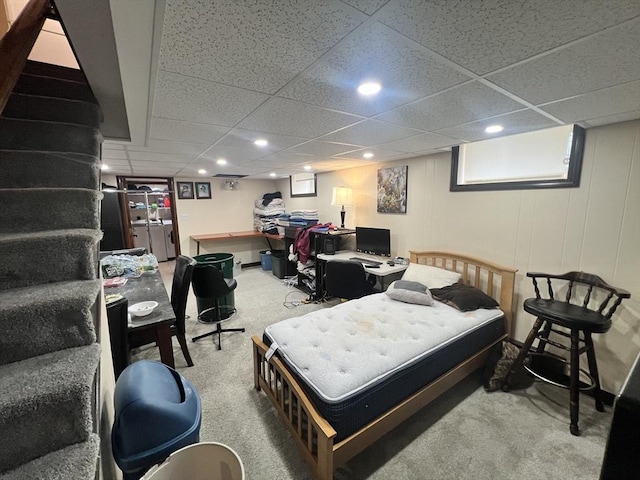 bedroom featuring carpet floors, a paneled ceiling, and recessed lighting