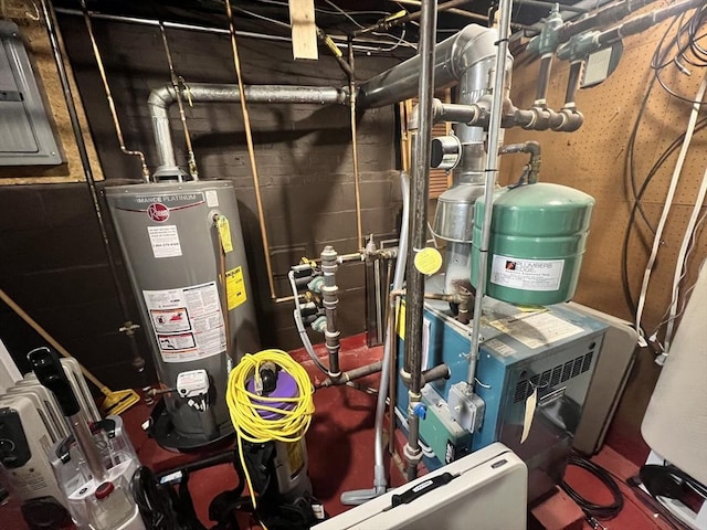 utility room featuring gas water heater