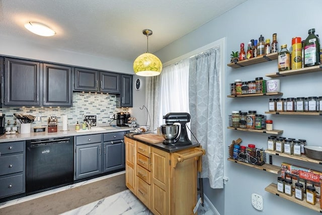 1102 Foxwood Cir Unit 1102, Peabody, MA 01960 - kitchen featuring dishwasher, backsplash, light marble finish floors, pendant lighting, and light countertops