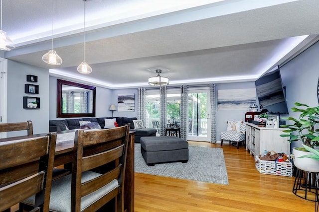 1102 Foxwood Cir Unit 1102, Peabody, MA 01960 - dining room with light wood finished floors and a raised ceiling