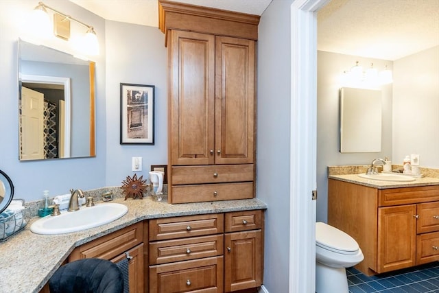 1102 Foxwood Cir Unit 1102, Peabody, MA 01960 - bathroom with vanity, tile patterned floors, and toilet