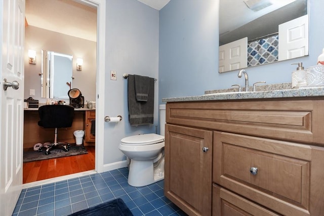 1102 Foxwood Cir Unit 1102, Peabody, MA 01960 - bathroom featuring toilet, vanity, tile patterned flooring, and baseboards