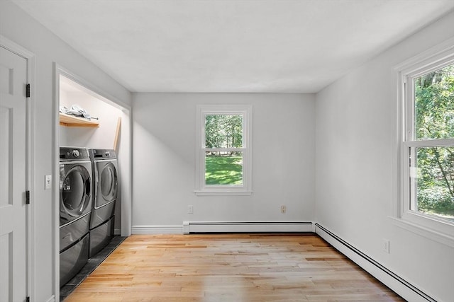 6 Candida Ln, Acton, MA 01720 - laundry room featuring a baseboard radiator, independent washer and dryer, and light wood-style flooring