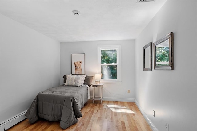 6 Candida Ln, Acton, MA 01720 - bedroom featuring a baseboard radiator and light wood finished floors
