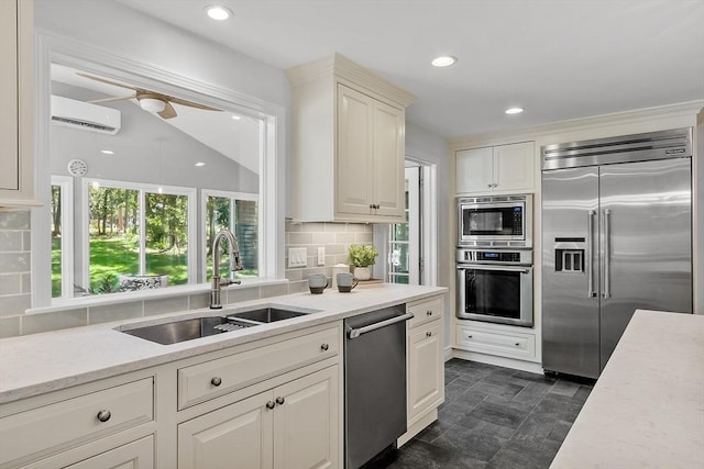 6 Candida Ln, Acton, MA 01720 - kitchen featuring built in appliances, a wall unit AC, healthy amount of natural light, backsplash, and recessed lighting