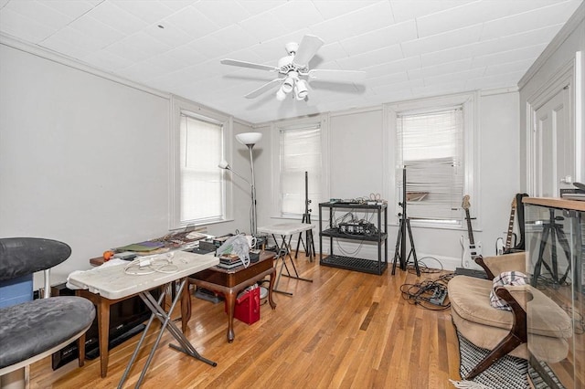 sitting room with ceiling fan, light hardwood / wood-style flooring, and plenty of natural light