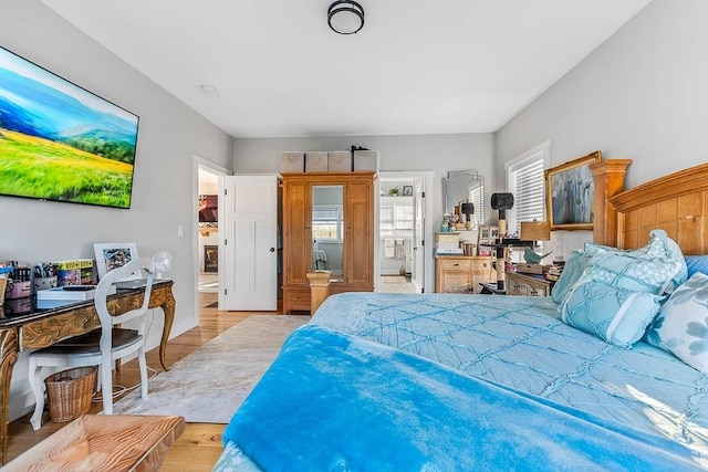 bedroom with light wood-style floors