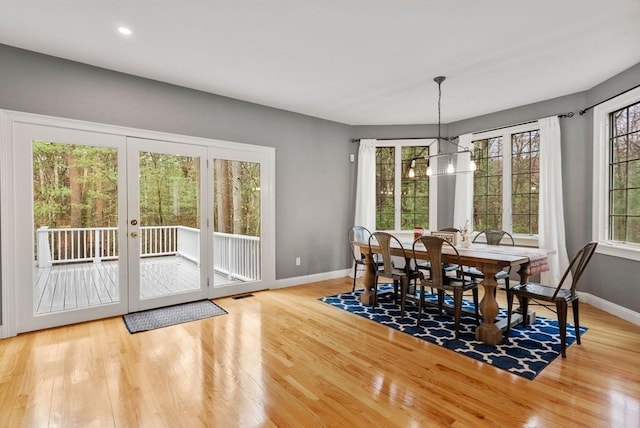 dining room with visible vents, baseboards, a chandelier, recessed lighting, and wood finished floors