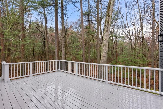 deck with a wooded view