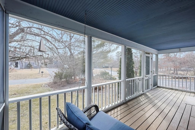 wooden deck with a yard