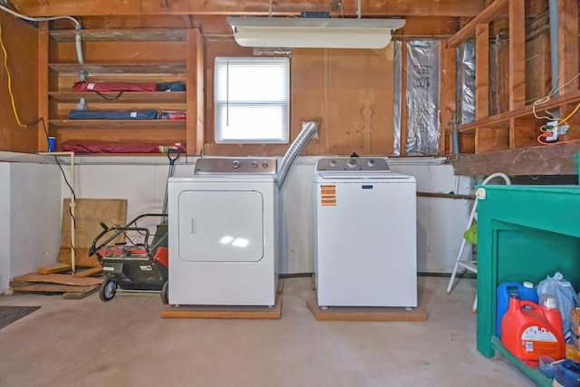 laundry area with washer and dryer