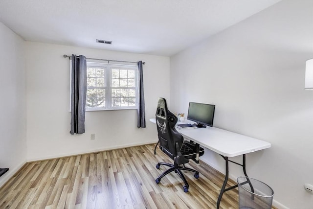 home office featuring light wood-type flooring