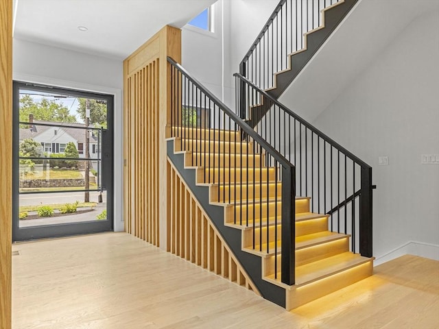 stairway featuring hardwood / wood-style floors