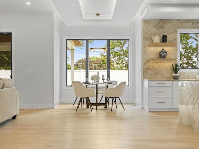 dining area with light wood-type flooring