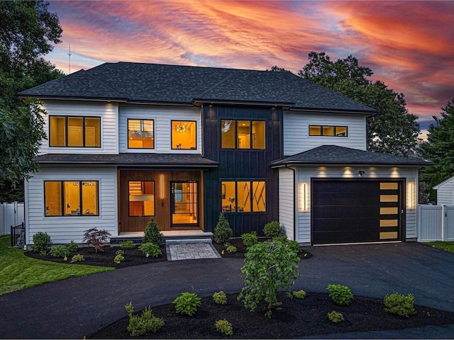 view of front of property with a garage