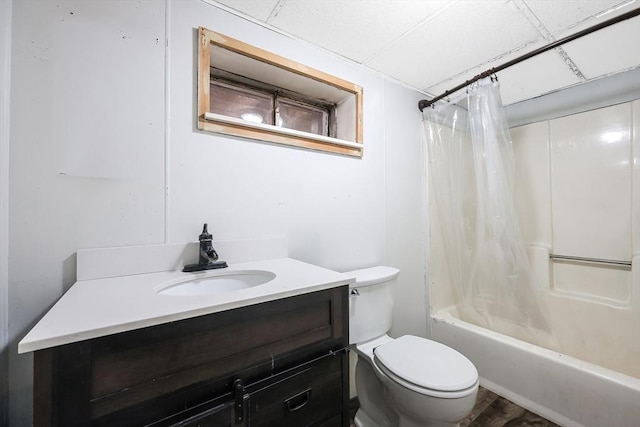 bathroom featuring toilet, vanity, and shower / bath combination with curtain