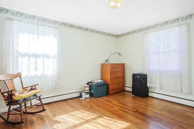 sitting room featuring hardwood / wood-style floors