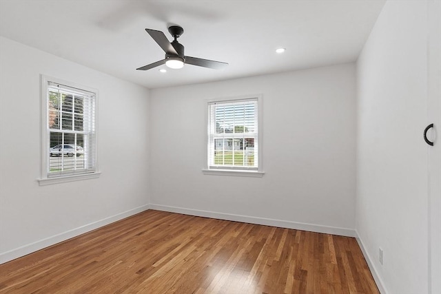 unfurnished room featuring recessed lighting, baseboards, ceiling fan, and light wood-style floors